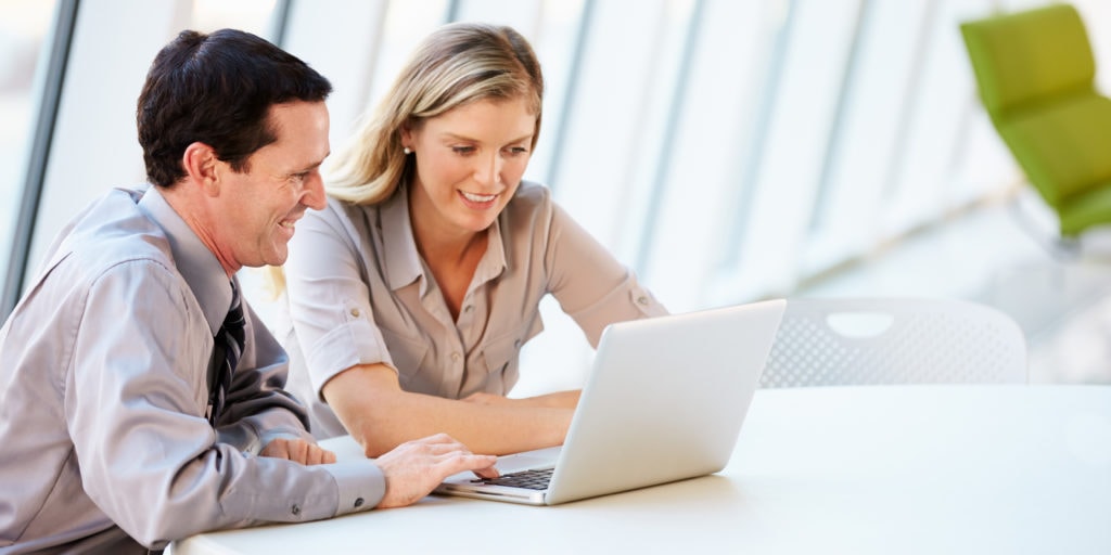 Business people Having Digital Marketing Meeting Around Table In Modern Office